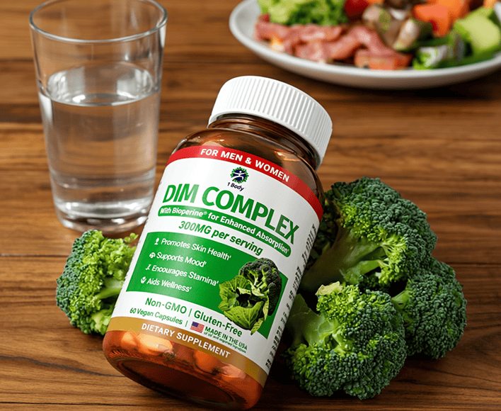 A bottle of DIM Complex dietary supplement placed on a wooden table, surrounded by fresh broccoli florets, with a glass of water and a blurred plate of salad in the background.