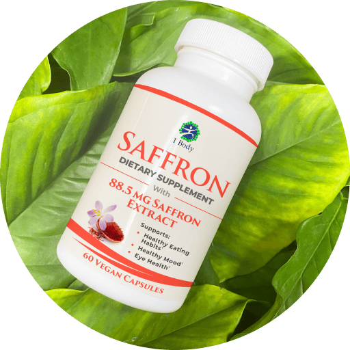 A white bottle of J Body Saffron dietary supplement, featuring a white label with red and black text, set against a circular background of fresh green saffron flowers.