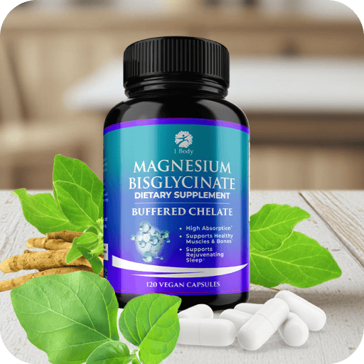 A bottle of 1 Body Magnesium Bisglycinate dietary supplement, surrounded by green leaves, ginger roots, and white capsules on a light wooden surface with a blurred indoor background.